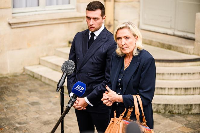 Jordan Bardella and Marine Le Pen speak to reports after meeting with Prime Minister François Bayrou, in Paris, September 2, 2025.