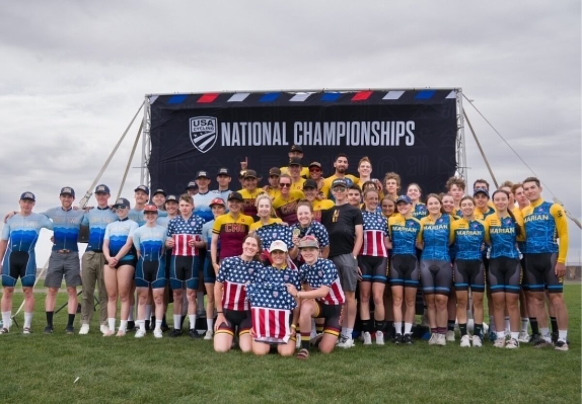 Collegiate athletes from different teams posing for a photo together, after a race.