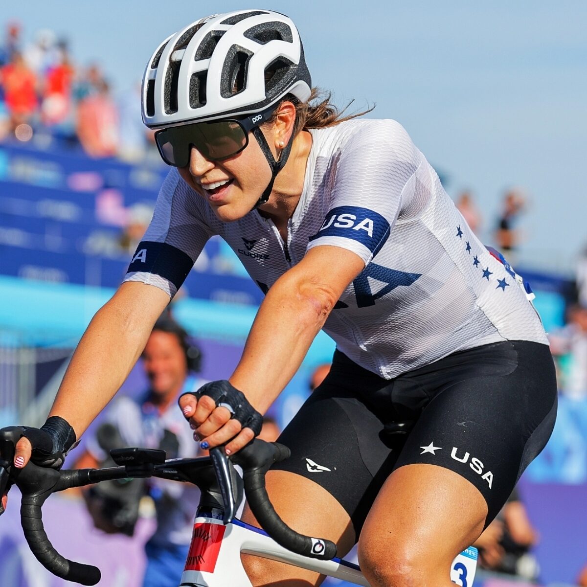 Close-up of Kristen Faulkner on her bike.